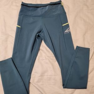 Nike Trail long leggings in turquoise with 3 pockets size small